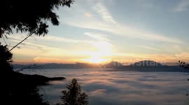 China: Sea of clouds, cherry blossoms in Yunnan mountains attract tourists