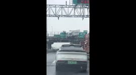 Truck crashes into skyway barrier, causing traffic jam in Shanghai, China