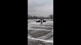 Unexpected skateboarding slip on ice in Beijing, China