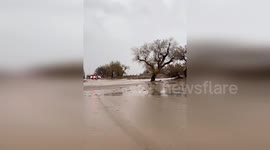 US: Floodwaters Sweep Vehicle As Rescuers Respond In Antelope Valley