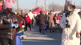 China: Beijing's open-air market bustles with shoppers before New Year's Day