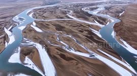 China: Snowfall brings mesmerizing patterns to banks of Tarim River in Xinjiang