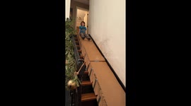 Dad builds cardboard staircase slide for Christmas fun—viral clip shows kid loving the DIY ride
