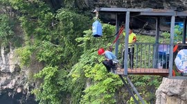 Slow-motion bungee at Sichuan stone sea scenic area in China