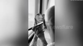 Bride embraces natural look and walks down aisle without her wig