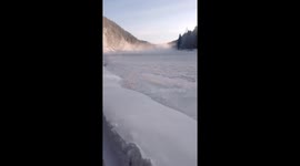 River ice surges in wave-like motion on Turka River, Buryatia, Russia
