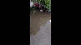 Vehicles stranded in floodwaters after storm in Buenos Aires, Argentina