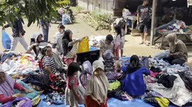 Padang Flood Victims Distribute Used Clothes