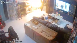 Mother carries burning power bank out of home following sudden explosion