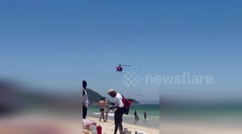 Brazil: Low-Flying Helicopter Sparks Panic On Copacabana Beach
