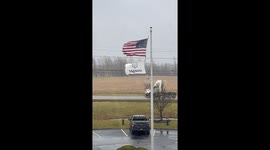 Strong wind blows flags in upstate New York