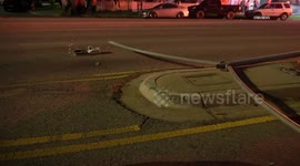 US, Los Angeles: Lake Balboa Car Hits Median And Flips