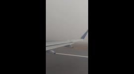 India: Plane Takes Off Amid Dense Fog at Delhi Airport
