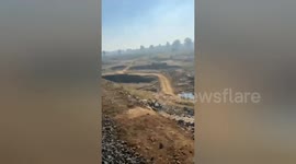 Injured cow carried from railway tracks in India