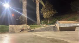 Skateboarder Falls Into a Rock