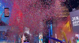 Confetti envelops Times Square during New Year's ball drop countdown
