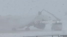 Blizzard conditions worsen on Rochester bridge, New York, USA