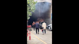 Tunnel electric car fire sparks quick response in Hubei, China