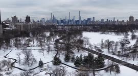Children enjoy sledding after snowfall in New York City