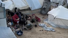 Displaced Palestinians scuffle with severe storm in Gaza's Al-Mawasi