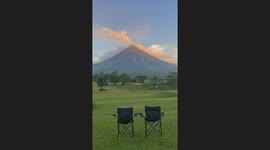 Chill in front of this spectacular volcano view in the Philippines