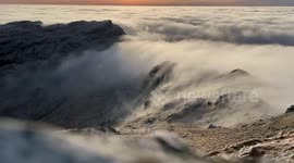 Timelapse captures clouds spilling over mountains in Scotland