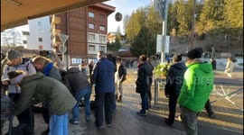 Mourners place flowers for Crans-Montana fire victims