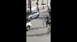 poppin wheelie ride through traffic