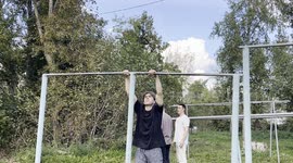 Man Hits His Head Swinging on a Metal Bar