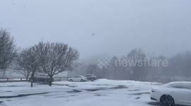 Snow squall reduces visibility on Route 106 in Massachusetts, USA