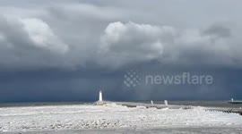 Storm Clouds Loom Over Historic Sodus Point Lighthouse as Winter Weather Hits New York