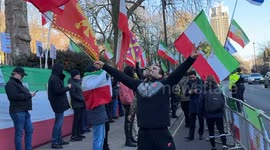 Protesters gather outside the Iranian Embassy in London to protest against government crackdown on demonstrators in Iran