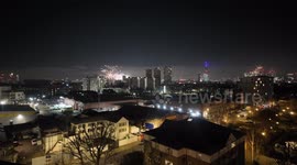 The London New Years Eve fireworks as viewed from the South of London in the Old Kent Road