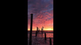 Stunning sunset over the remains of Redington Long Pier, Florida, USA
