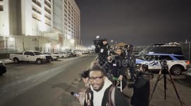 Members of the media wait behind police barrier for Maduro arrival at Metropolitan Detention Center