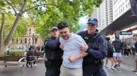 Activist Drew Pavlou is arrested by police in Sydney, Australia