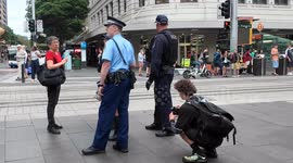 Woman appears to be arrested for ‘globalise the intifada’ writing on jacket in Sydney, Australia
