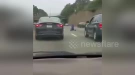 Newsflare Edit - Man rides Big Wheel on Interstate 76 in Philly