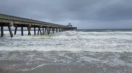 Man decides to swim in the sea as Hurricane Matthew approaches
