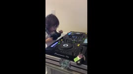 Little dj girl playing music