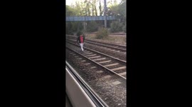 Man walks onto tracks and has bizarre stand-off with train