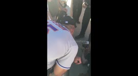 Tim Tebow prays and stays with fan after seizure
