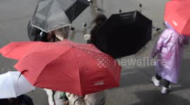 Playing in the rain , London 