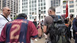 Police remove man believed to have opposing views from protest against capture of Venezuelan leader