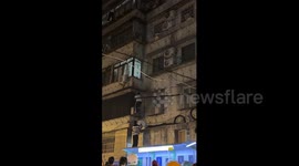 China: Chinese man climbs building by hand to rescue child stuck in window bars