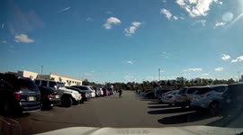 Two Vehicles Backing Out of Parking Spots Collide