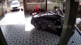 Woman Slips and Falls While Chasing After Runaway Vehicle