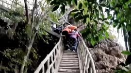 Russian dies while climbing hillside pagoda in southern Thailand during hot weather