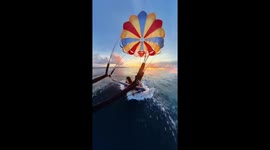Parasailing goes wrong as tourists are dragged through sea