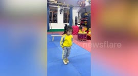 Tiny kung fu prodigy stuns with flawless traditional routine
